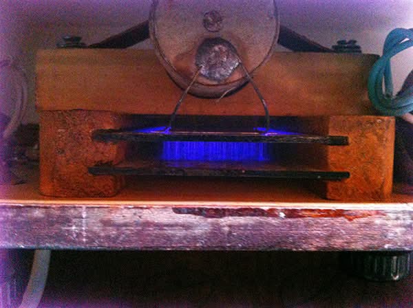 Nikola Tesla's patented electrostatic ozone generator seen in operation inside the
1920's RenuLife …