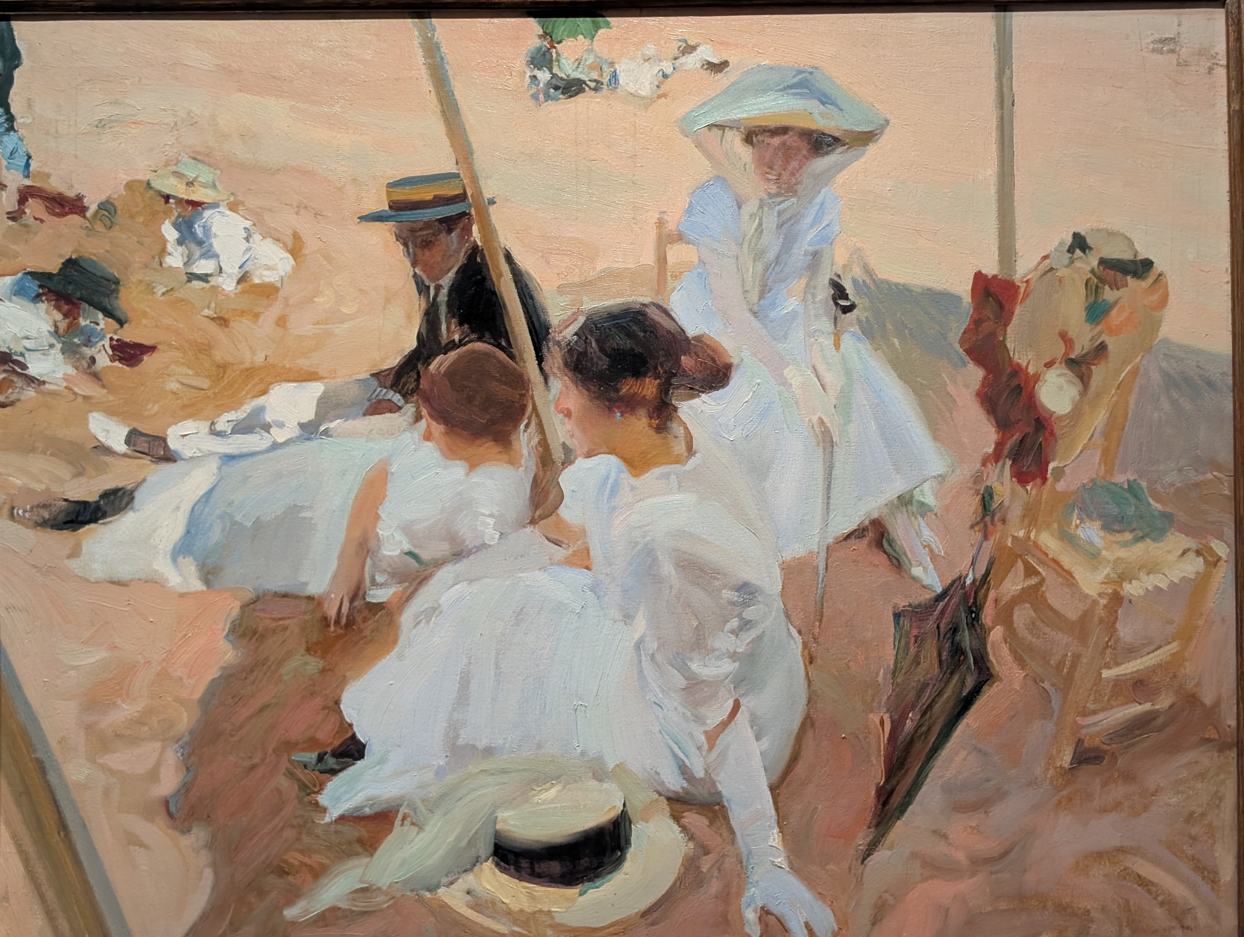 That painting is a masterpiece by the Spanish painter Joaquín Sorolla, titled "Under the Awning, Za…