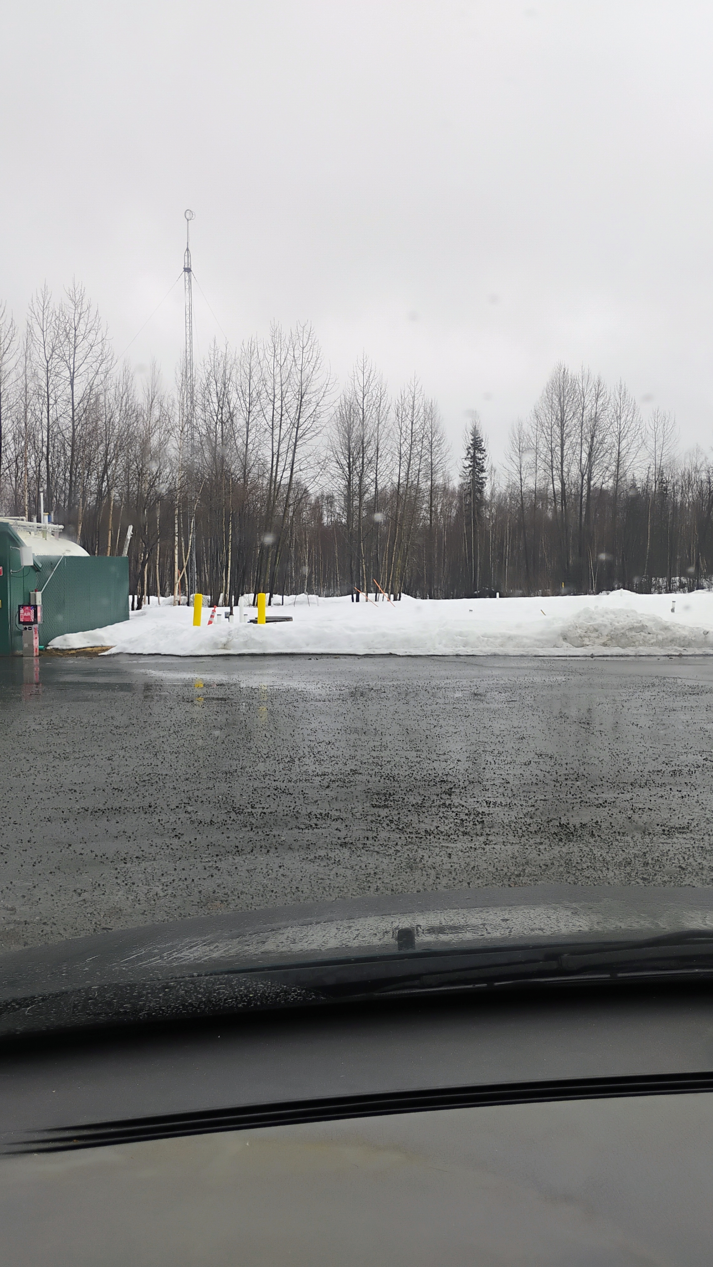 Trapper Creek, Alaska in April through the windshield of a 2009 Chrysler Town and Country.