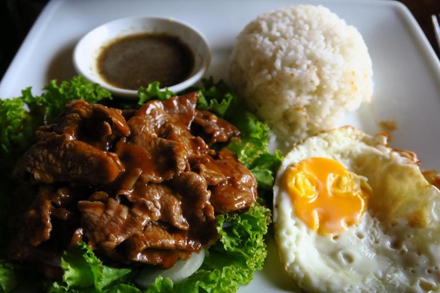 Beef Lok Lak is a classic Cambodian stir-fry featuring tender, marinated beef cubes seared over hig…