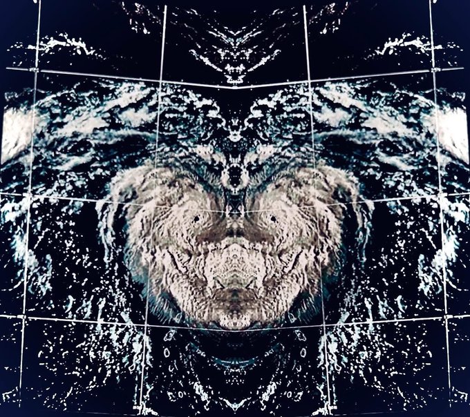 Half of the satellite image is from a hurricane. The other half is the reverse of that same photo!
