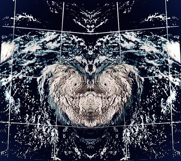 Half of the satellite image is from a hurricane. The other half is the reverse of that same photo!