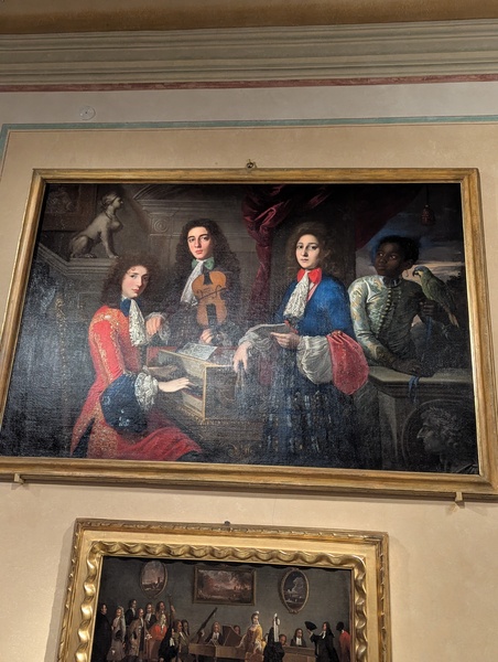 Bartolomeo Chritofori, invented the piano, I believe he's the one with the red coat