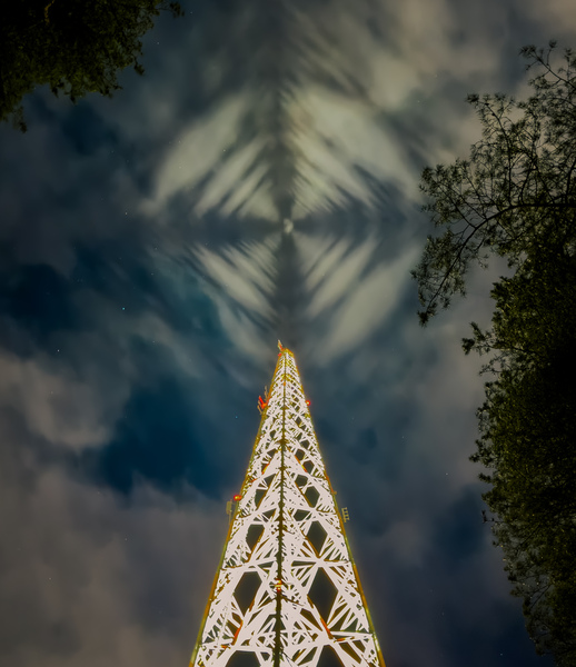 Patterns in the Sky.
Wicked phenomena, lights of the radio tower created a tower shaped pattern to …