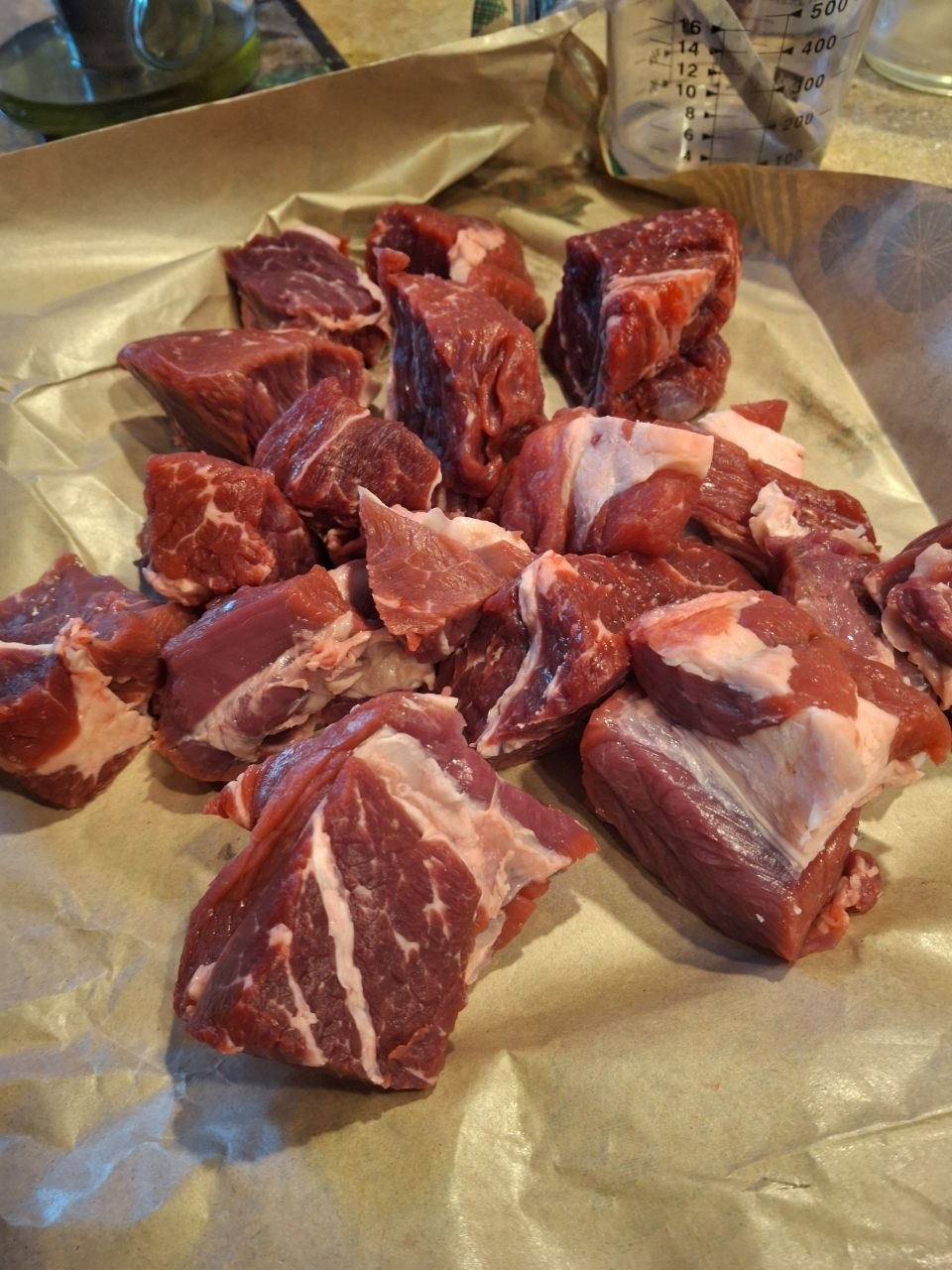 cutting up grass fed chuck for soup