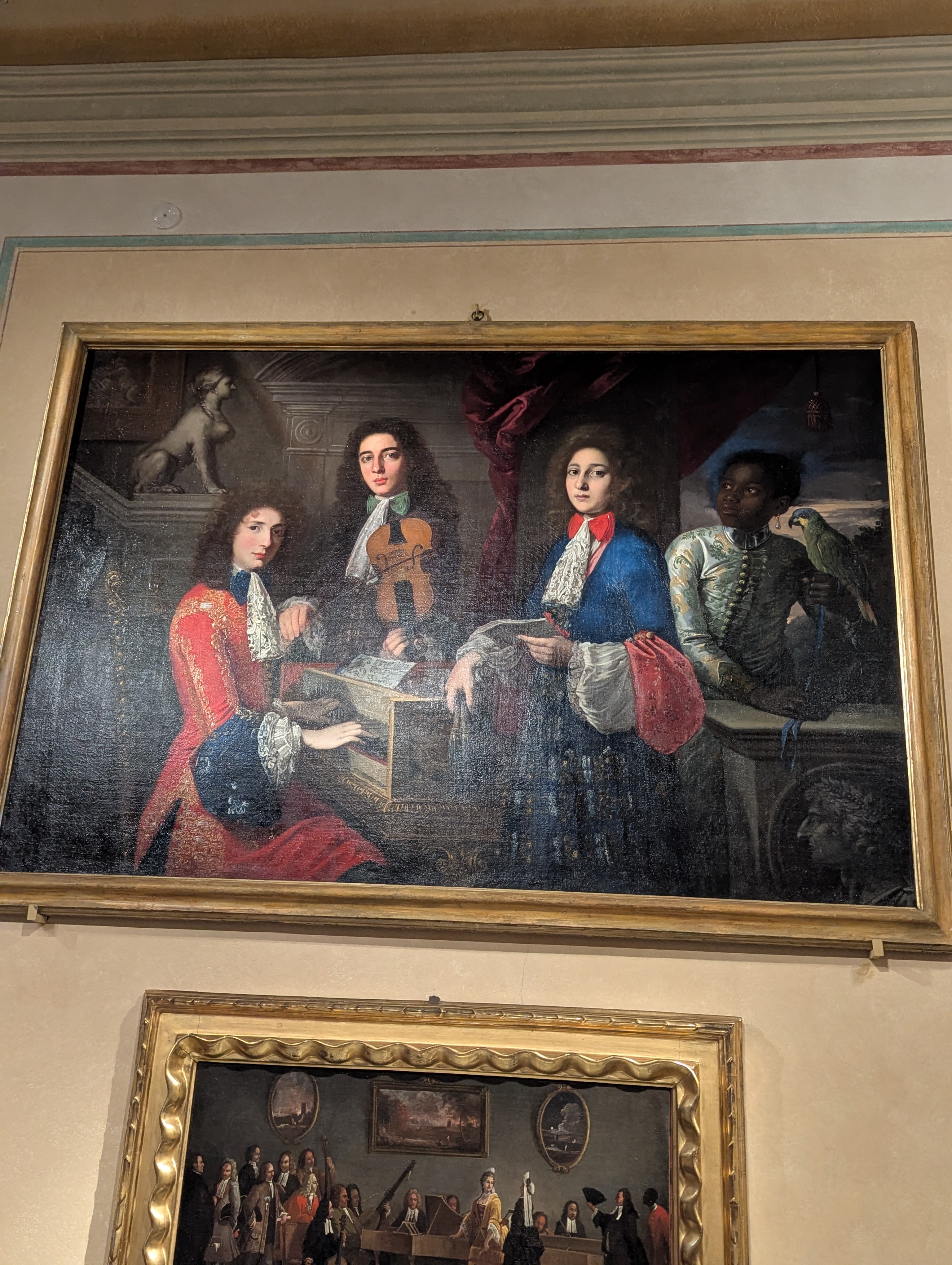 Bartolomeo Chritofori, invented the piano, I believe he's the one with the red coat